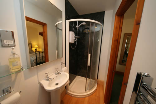 With a well equipped en suite bathroom